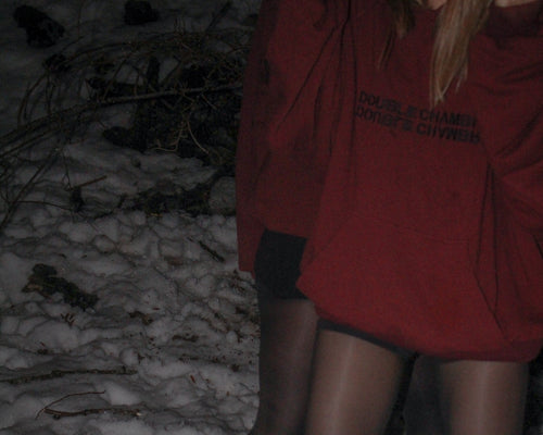 OVERSIZED RED HOODIE WITH A BLACK “DOUBLE CHAMBRE"CHEST PRINT, KANGAROO POCKET, HOOD AND RELAXED FIT.