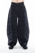 WASHED BLACK OVERSIZED CURVED-LEG JEANS WITH A LOW-RISE WAIST, FIVE-POCKET CONSTRUCTION, BUTTON FLY, SILVER HARDWARE AND A FADED FINISH.