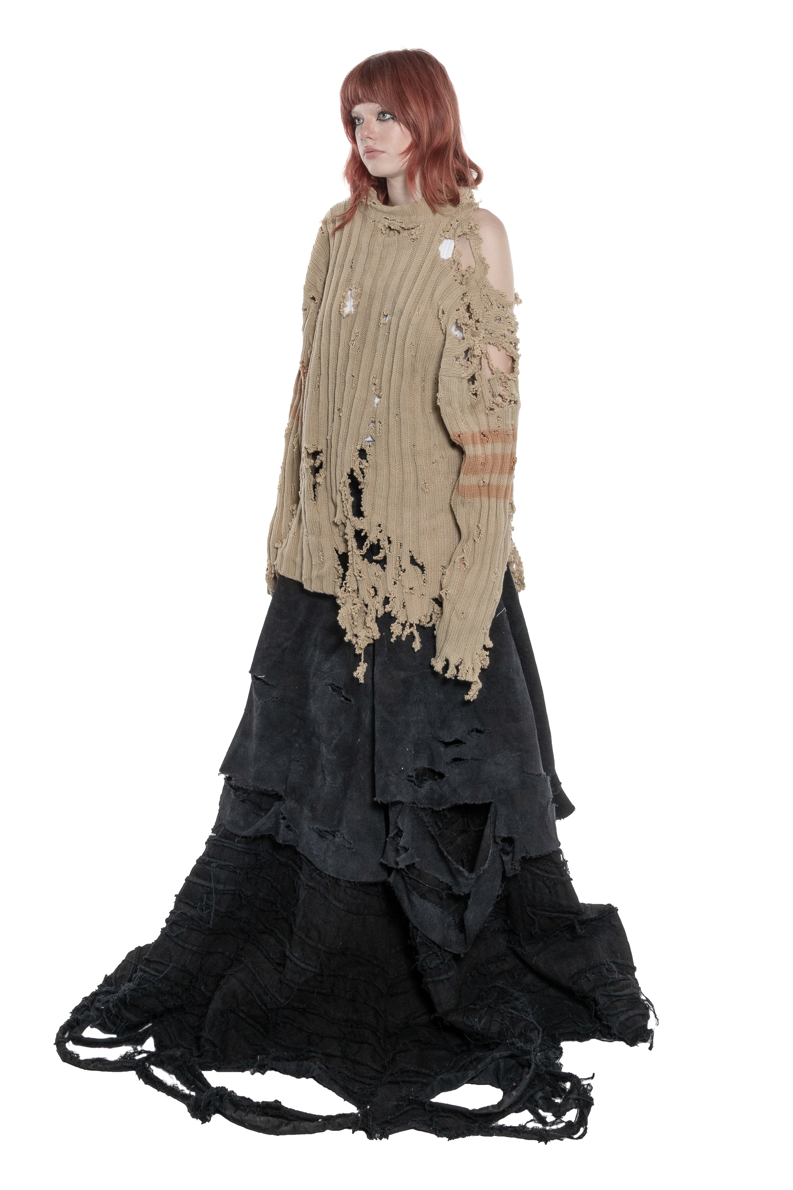 BEIGE DISTRESSED RIBBED KNIT SWEATER WITH HAND-FRAYED DETAILS, HIGH NECK, OVERSIZED FIT, DESTROYED FINISHES AND FADED STRIPES ON THE SLEEVES.